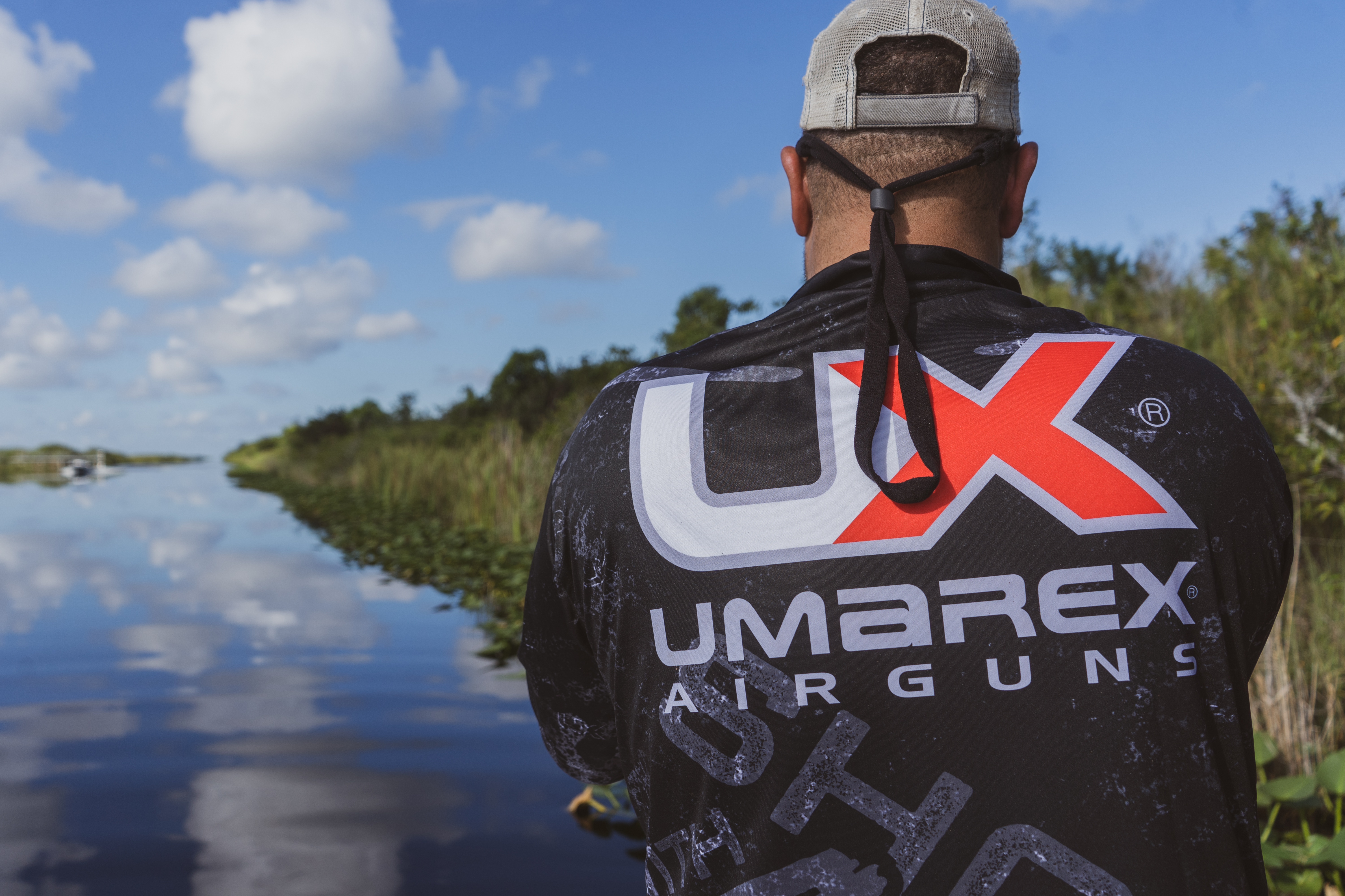 Corey Brossman bowfishing on calm water